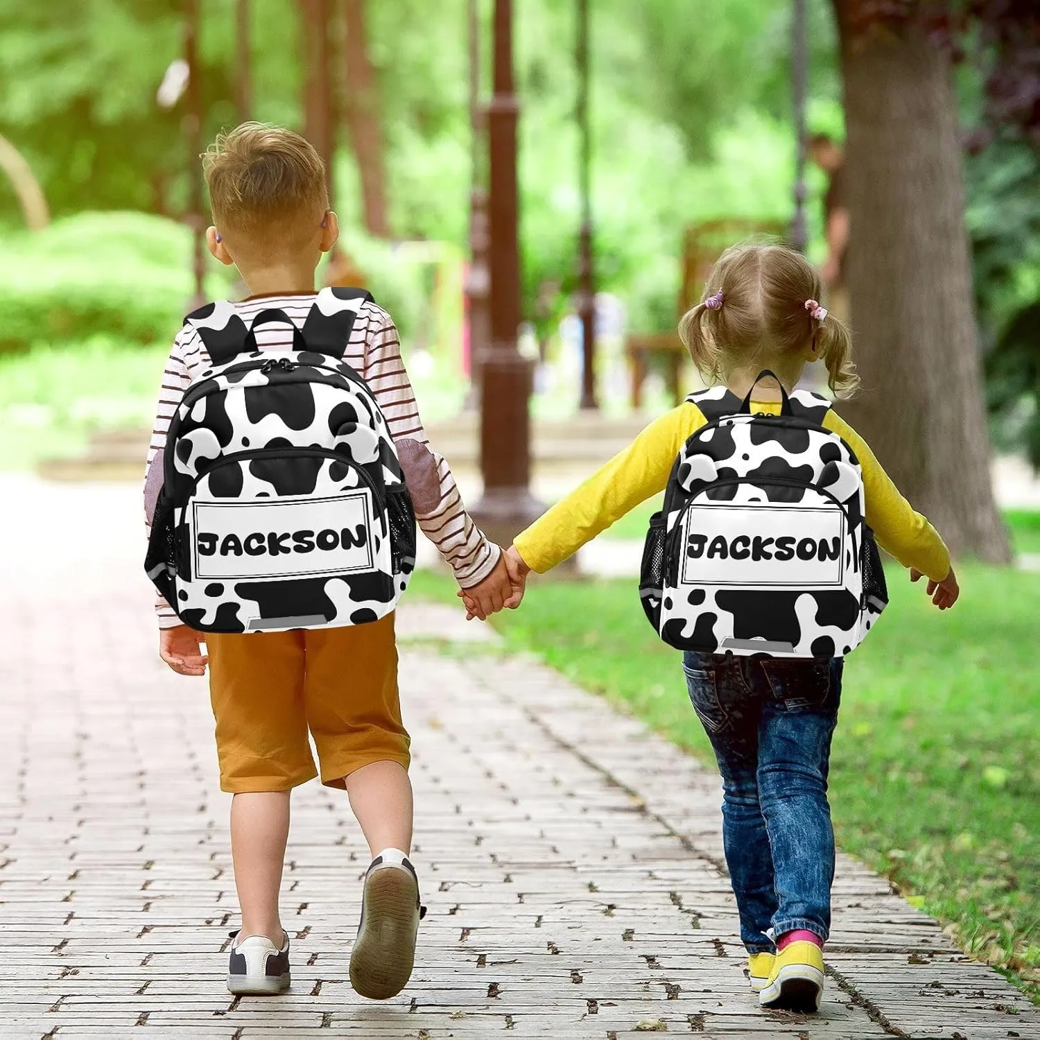 Custom Black White Preschool Backpack Cow Skin Daycare Bookbag School Backpack with Traction Rope Fashion Casual Cartoon School Travel Picnic Birthday for Kids 3-6