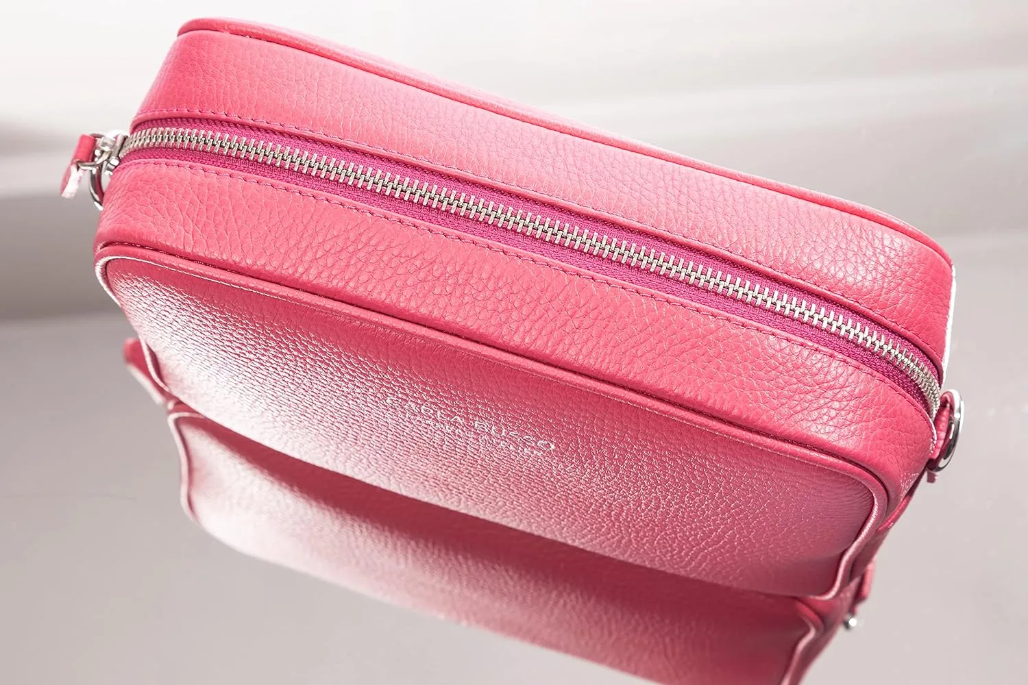 Paulette Three-in-One Crossbody Bag-Purse, Clutch, and Fanny Bag for Women with shoulder strap, belt, and handle.