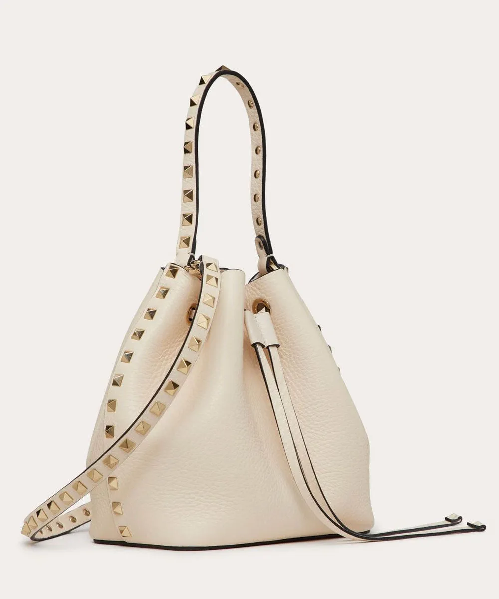 Rockstud Textured Leather Bucket Bag In Light Ivory